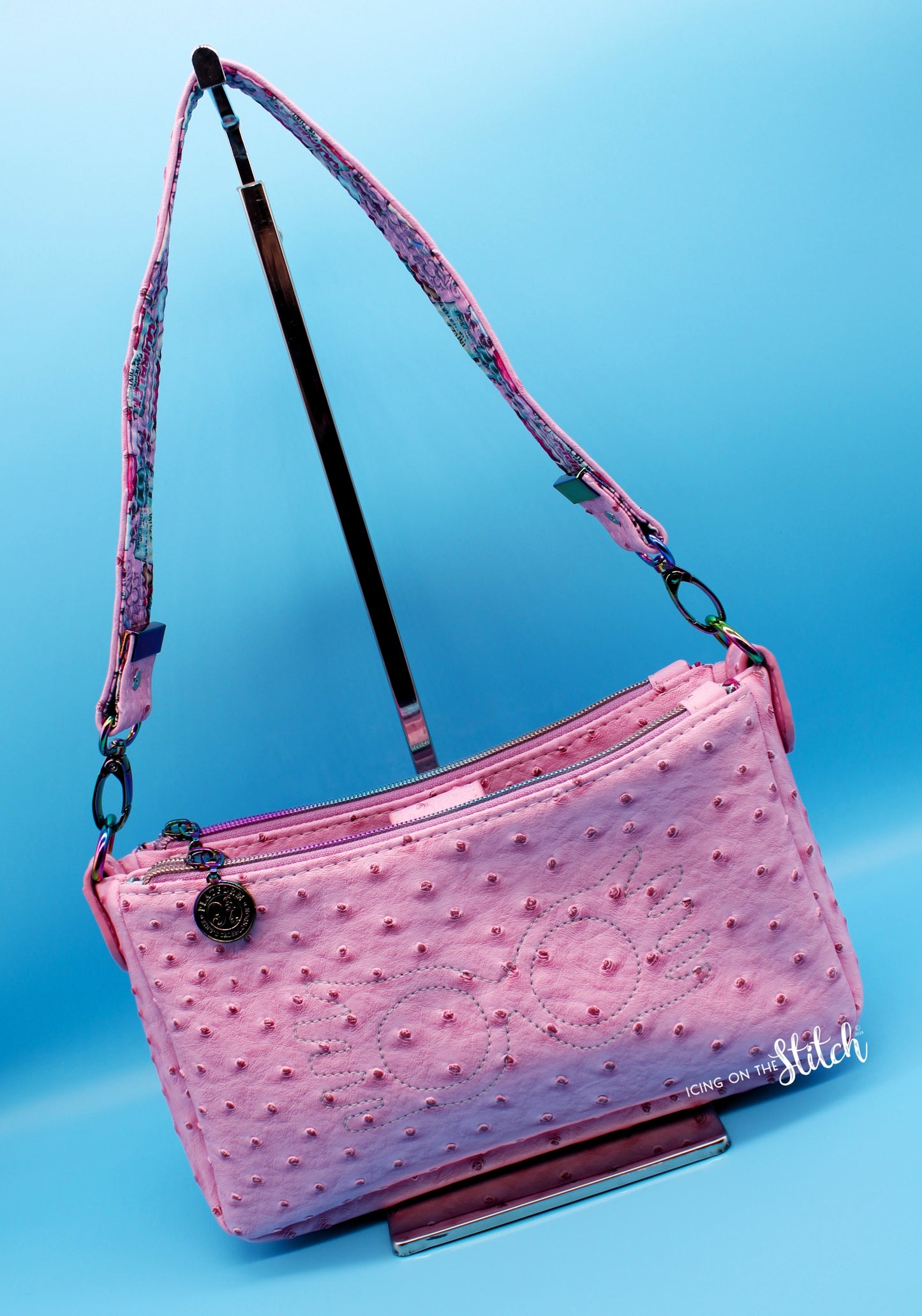 Quibbler-Themed Pink Ostrich Faux Leather Aries Crossbody Bag