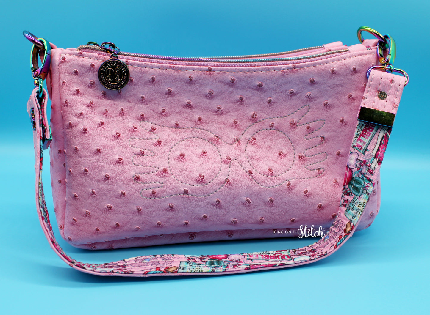 Quibbler-Themed Pink Ostrich Faux Leather Aries Crossbody Bag