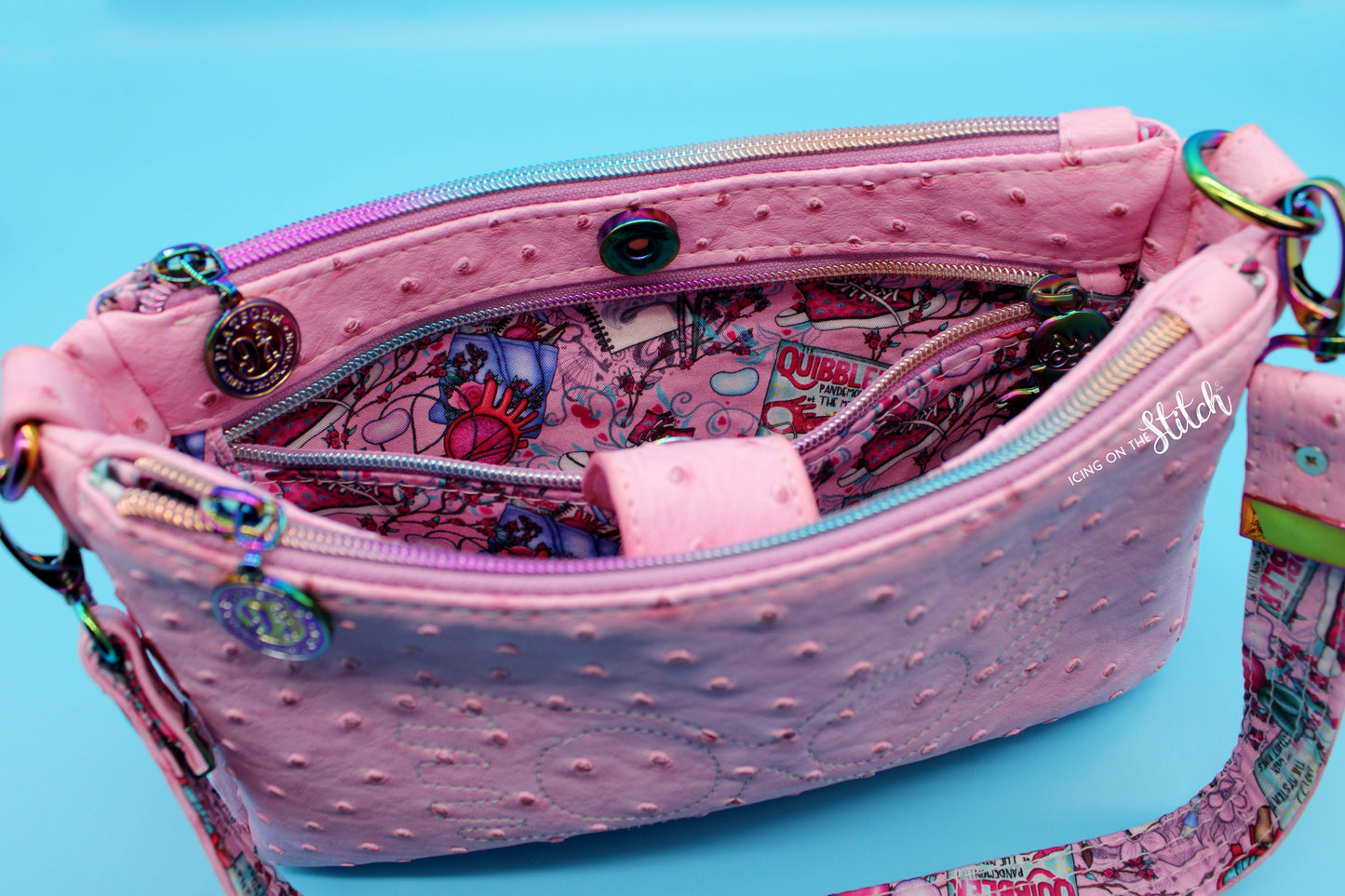 Quibbler-Themed Pink Ostrich Faux Leather Aries Crossbody Bag