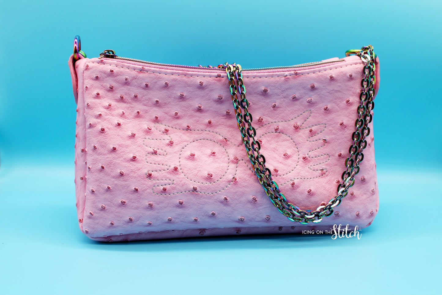 Quibbler-Themed Pink Ostrich Faux Leather Aries Crossbody Bag